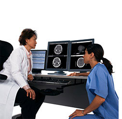 Physician and Nurse viewing medical images.
